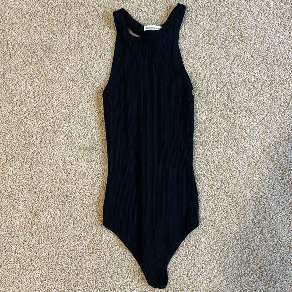 Abercrombie and Fitch black bodysuit. Snaps at the bottom. Size medium.